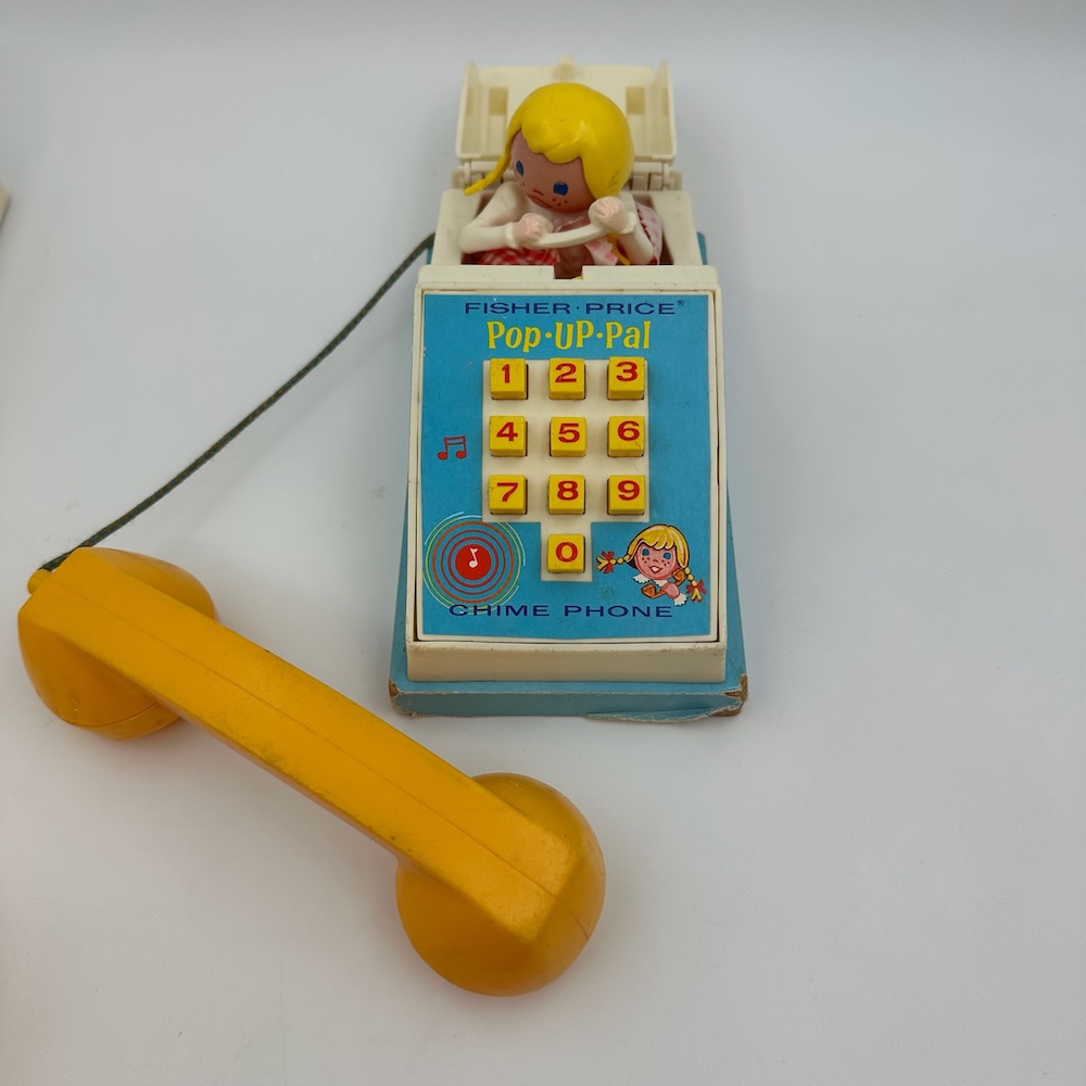 Fisher Price Pop Up Pal Toy Phone - Upcoming Bellevue Estate Sale Auction by Rain City Estate Sales