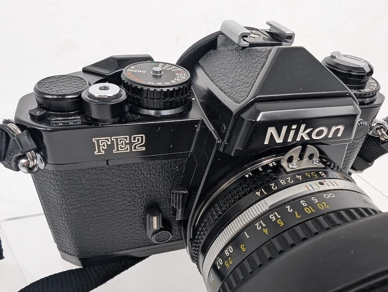 Nikon FE2 black 35mm film camera - Redmond estate sale by Rain City Estate Sales