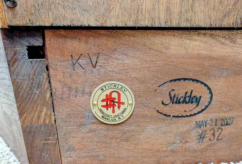 Stickley Furniture Sticker on the bottom of a chair - Redmond estate sale by Rain City Estate Sales